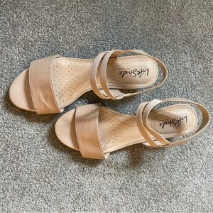 Selling the nude color sandals size 7 barely worn.